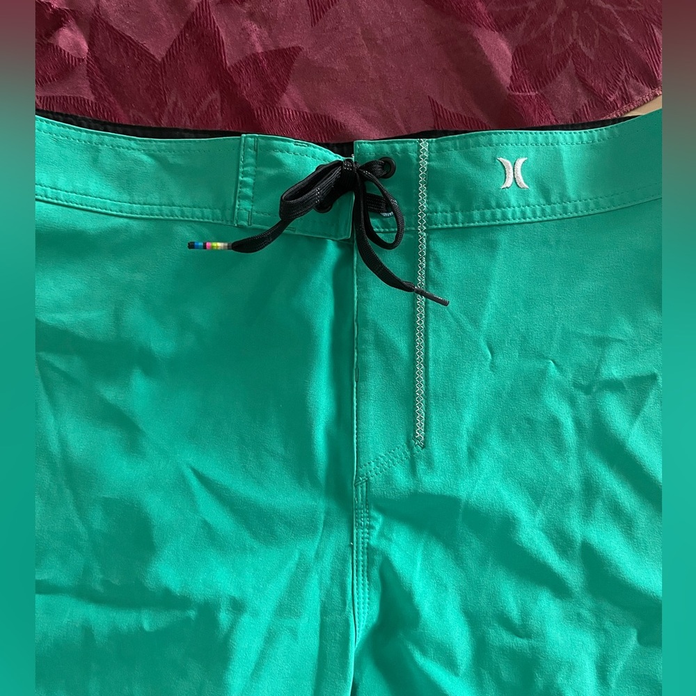Men’s size 36 board shorts bathing suit.